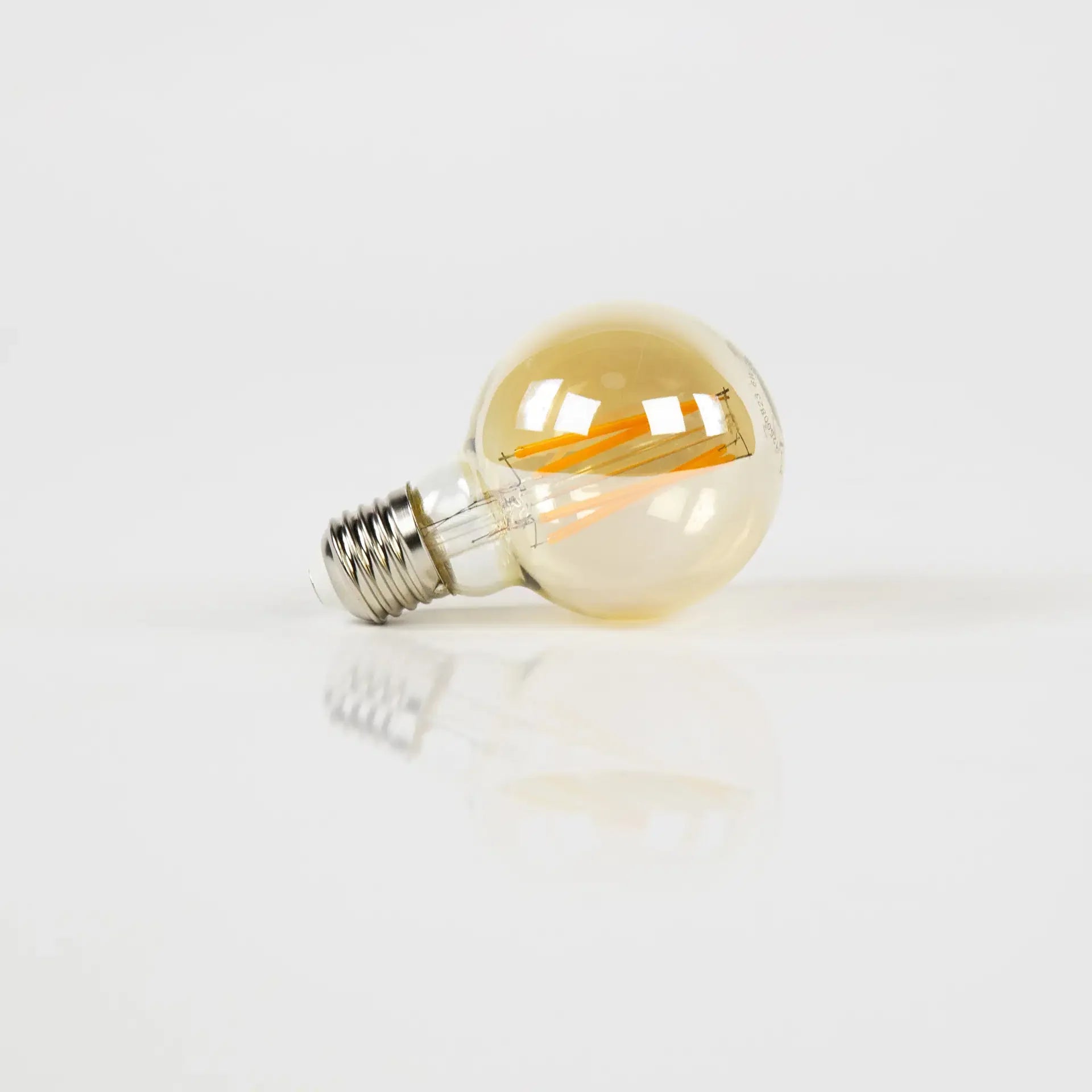 Lichtbron LED [G70] - Bol Ø7 - E27 6W 2100K 450LM - Dimbaar - Amberkleurig Glas